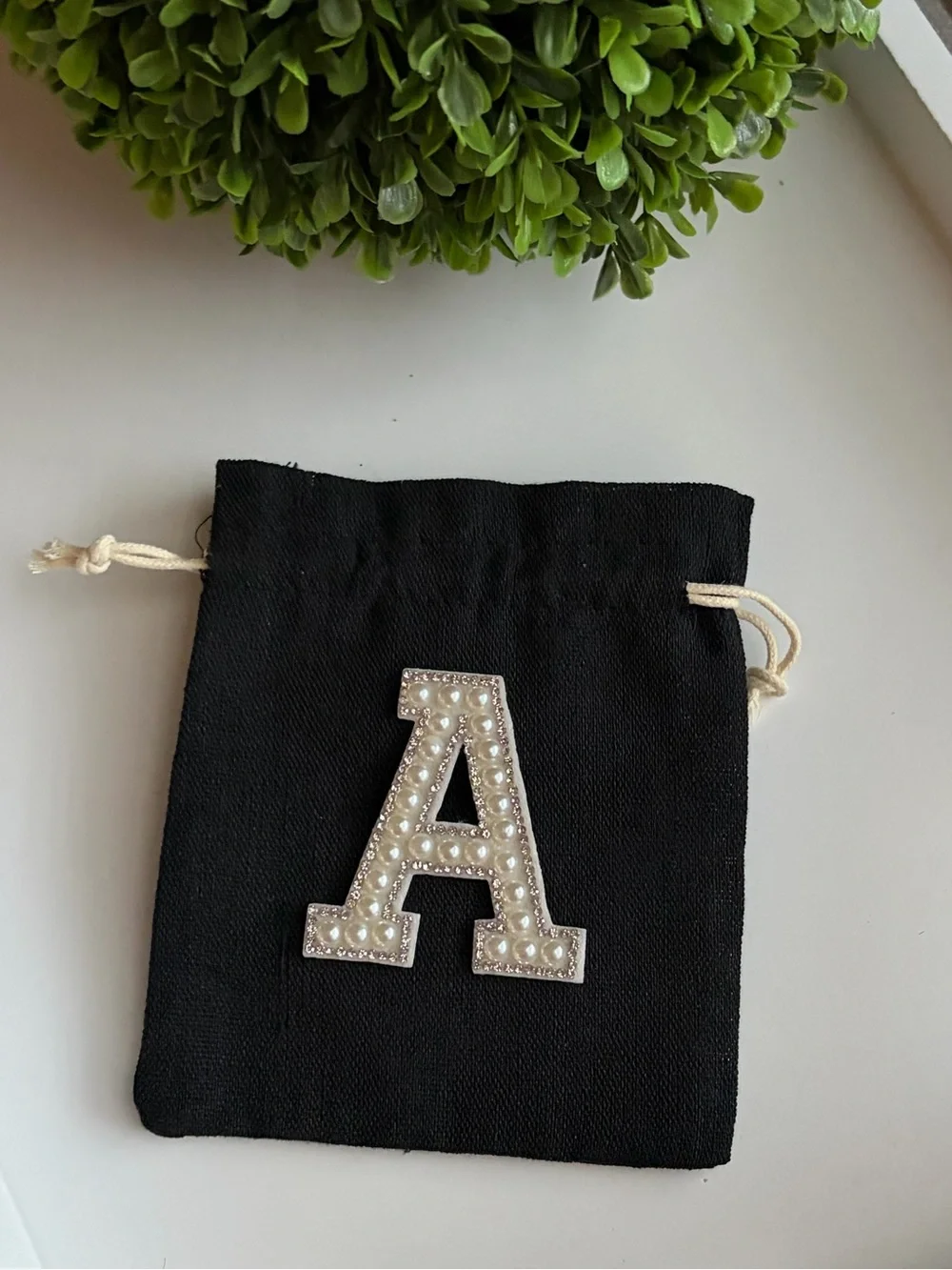 Black Drawstring Pouch with Pearl-Embellished Initial Accent - choose one